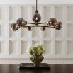 Elevate your space with the Smyth Chandelier, featuring elegant design and stunning illumination for a perfect blend of style and sophistication.