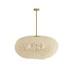 Large rattan style ceiling light with brass fixture to the ceiling