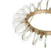 Playful pendant fashioned with clear glass hoops and exposed bulbs that surround a circular framework of antique brass iron