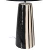 Black and cream striped table lamp with a black shade
