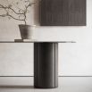 A sophisticated dining table by Domkapa with a luxury leather finish