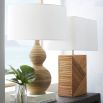 Elegant Balearic inspired table lamp with rattan wrapped curvaceous base