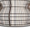 Black rattan pendant light with curvaceous silhouette and brass drop
