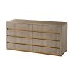 Neutral, modern chest of drawers with brass accents