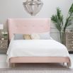 Luxury Scandinavian style bed with soft edges and curves, on wooden tapered legs