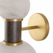 Wall sconce with two contrasting size spheres and black and gold accents