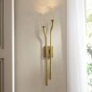 Illuminate your space with the Italo Wall Sconce, featuring a sleek design and warm glow that enhances any decor. Perfect for stylish accent lighting!