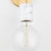 A chic white marble and aged brass dual globe wall lamp