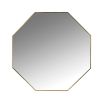 The perfect finishing touch for any interior style, this minimal, eight-sided wall mirror boasts a gorgeous antiqued gold finish that will add a touch of timeless elegance to your home. 