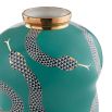 A teal curvaceous vase by Jonathan Adler with white and gold snake illustrations