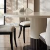 Upholstered dining chair with sleek split back