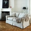 Classic, luxury designer sofa with loose covers in luxury grey linen