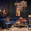 A luxury blue modular sofa with black legs