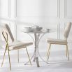 contemporary marble table with curved nickel legs