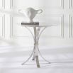 contemporary marble table with curved nickel legs