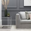 Contemporary style modern sofa with angular frame and silver effect plinth