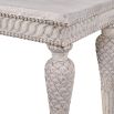 A gorgeous French-style distressed wooden console table