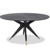 Dining table with statement base of slender spokes and oak veneer top