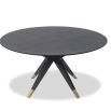 Dining table with statement base of slender spokes and oak veneer top