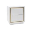 A sleek bedside table by Liang & Eimil with a white finish and brushed brass details