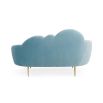 The luxurious sky blue ether cloud sofa by Jonathan Adler with polished brass feet