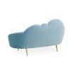 The luxurious sky blue ether cloud sofa by Jonathan Adler with polished brass feet