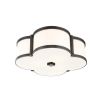 A luxurious old bronze and white glass ceiling lamp