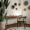 Simple yet stylish desk with wooden table and metal base