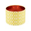 A luxury lampshade by Eva Sonaike with a yellow African-inspired pattern