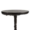 Sculptural black drinks table with cylindrical top