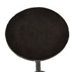 Sculptural black drinks table with cylindrical top