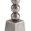 Side table in vintage nickel finish with playful totemic base and circular tabletop