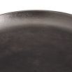 Side table in vintage nickel finish with playful totemic base and circular tabletop