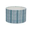 A luxury lampshade by Eva Sonaike with an indigo African-inspired pattern