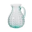 this pitcher features a unique bubble design and vibrant green colour