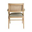 A luxurious Scandinavian-inspired rattan and natural ash upholstered armchair