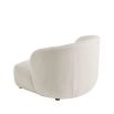 Sumptuous large boucle upholstered curved armchair