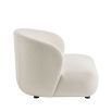 Sumptuous large boucle upholstered curved armchair