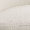 Sumptuous large boucle upholstered curved armchair