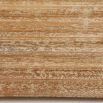 Grooved wooden coffee table with three legs and oval table top
