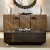 Angular rectangular cocktail table in dark wood finish.