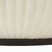 Round concrete coffee table with fluted edges