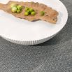 Round concrete coffee table with fluted edges