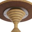 Round wooden table top with sculptural hourglass silhouette and brass inlays