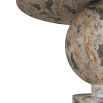 Marble-like pedestal entry table with sculptural top playfully balancing on totemic base