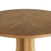 Sculptural wooden entry table with cinched illusion base