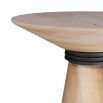 Sculptural accent table crafted in whitewashed wood with a radial-edge top and textured blackened iron wraps