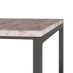 Marble top side table with iron base forming solid panel on one side and open framework on the other 