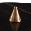 Side table with sharp antique brass base and black round table top