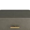 Waterfall-edged side table in sleek topstitched graphite leather and brass handle